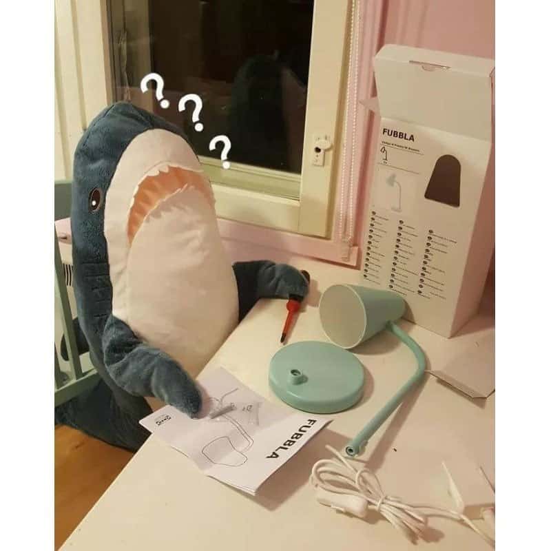 kawaii blue shark plush pillow studying