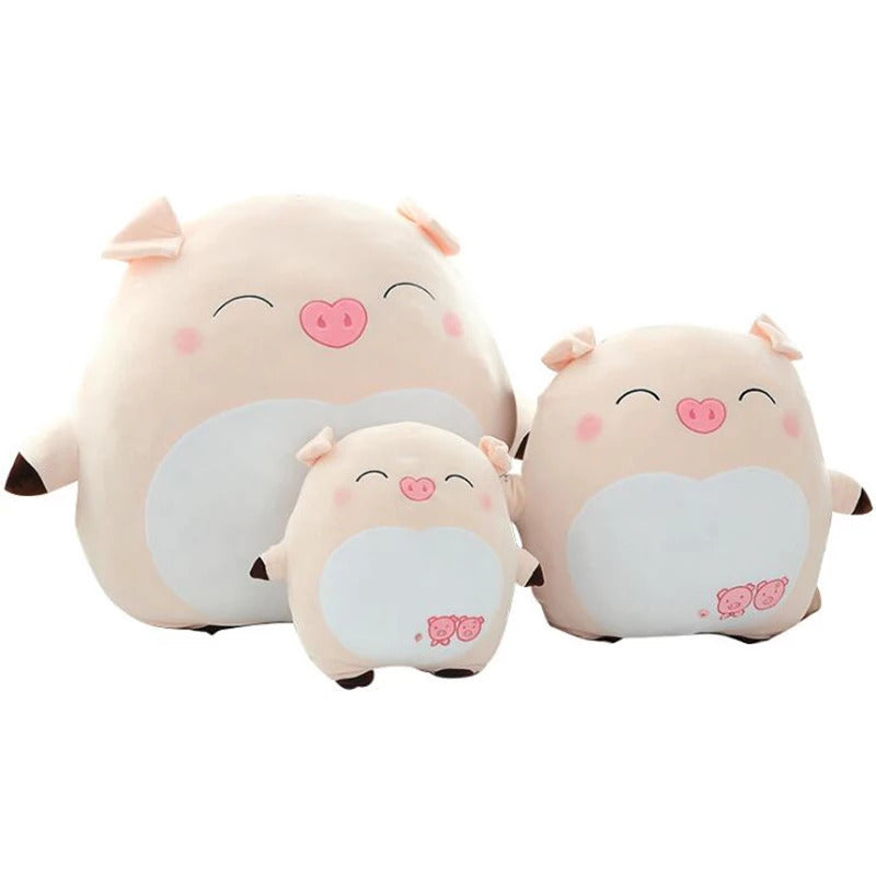 three cute pig stuffed animals