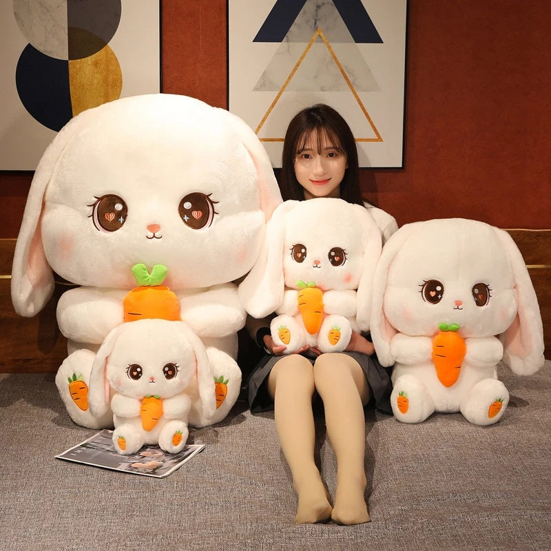 Woman sitting beside Kawaii Rabbit Plushies