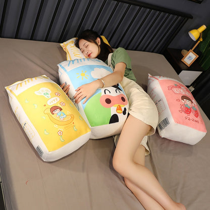 woman sleeping beside kawaii milk plushie