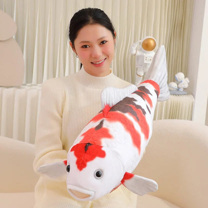 woman carrying a koi fish plush