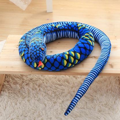 blue giant snake stuffed animal toy in a table