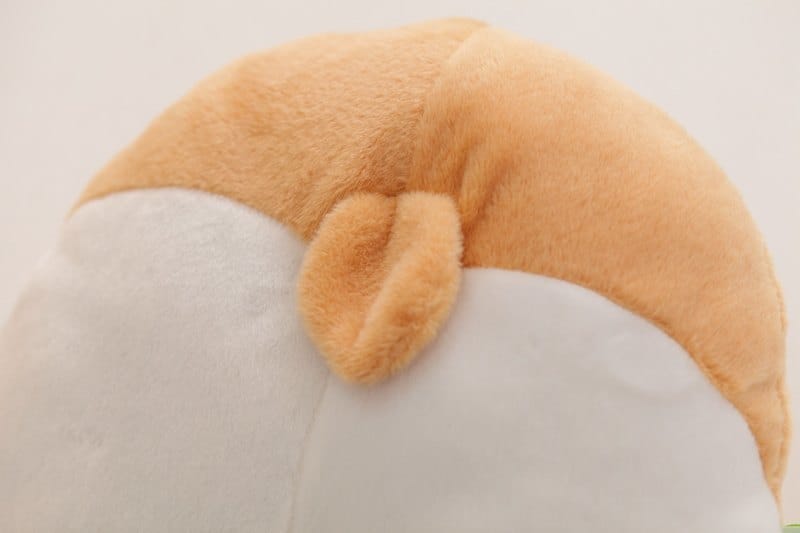 close up view of corgi tail plush