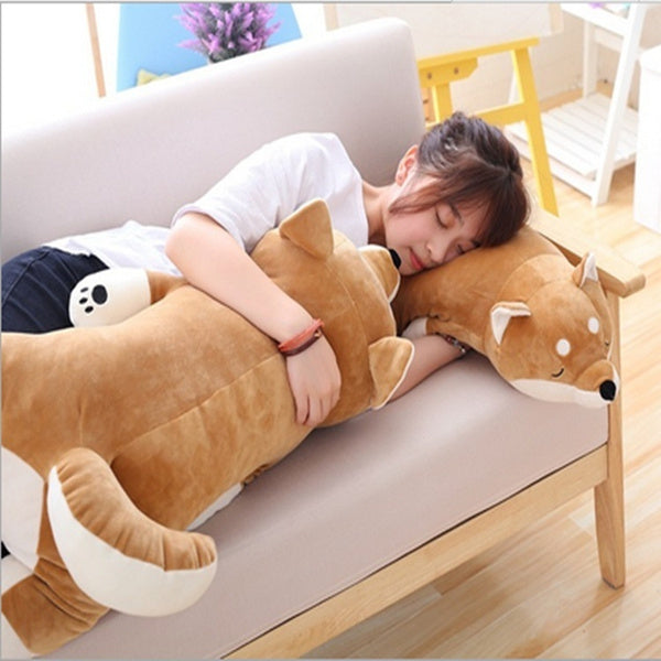 sleeping with a giant shiba inu plush