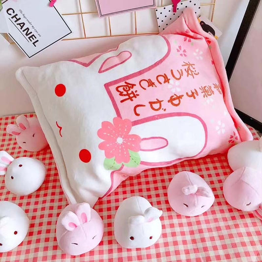 Cuddle with cuteness overload! Get your kawaii bunny pillow now.