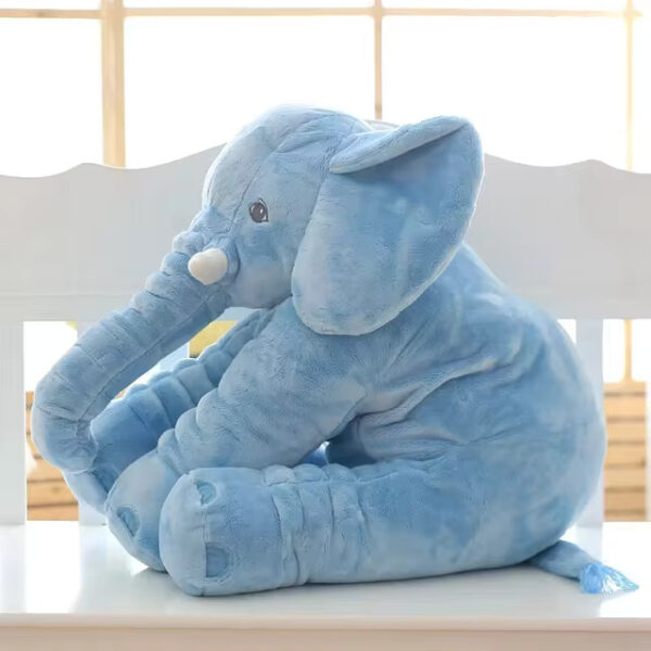 A blue baby elephant stuffed animal sitting.