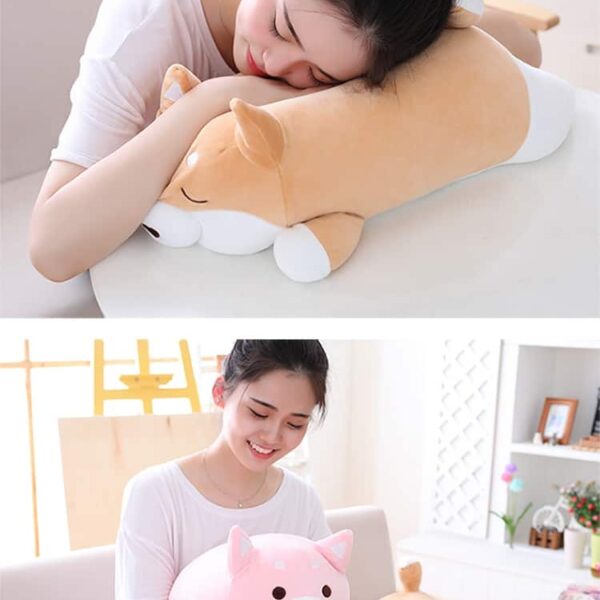 woman holding and sleeping on a cute fat shiba inu plush toy