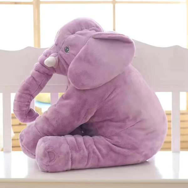 A purple baby elephant stuffed animal sitting.