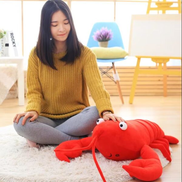 woman-playing-with-lobster-plush