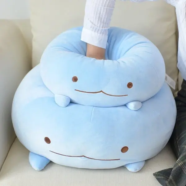hitting a sumikko gurashi plush