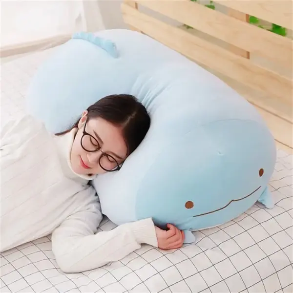 sleeping on a sumikko gurashi plushies