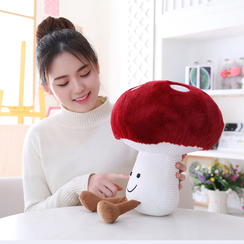 Kawaii mushroom plushie in pastel colours with a sleepy face