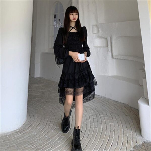 a walking woman dressed in gothic lolita