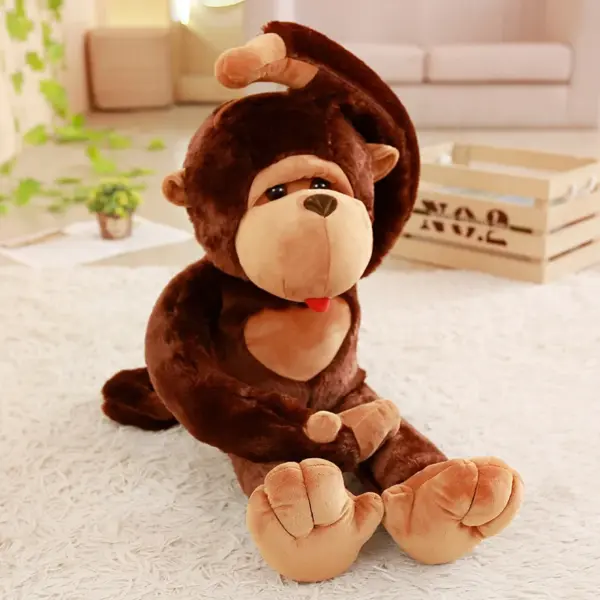 Soft and flexible monkey stuffed animal stretching its arms in a playful pose on a carpet.