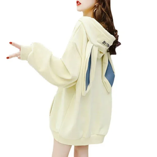 Apricot-colored bunny hoodie with cute ear detailing and ribbed cuffs