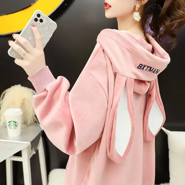 Bunny hoodie in pastel pink featuring embroidered whiskers and soft fleece lining