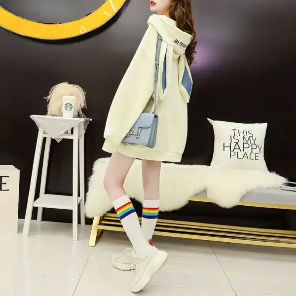 Bunny hoodie in soft apricot with a button-up front and long ear detailing