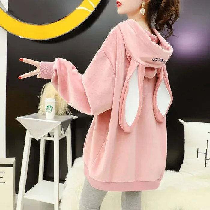 Soft pink bunny hoodie with kawaii plush accessories — kawaii fashion lifestyle