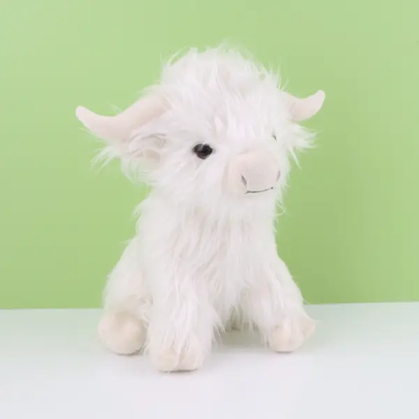 front view of white sideview of white Highland Cow Stuffed Animal